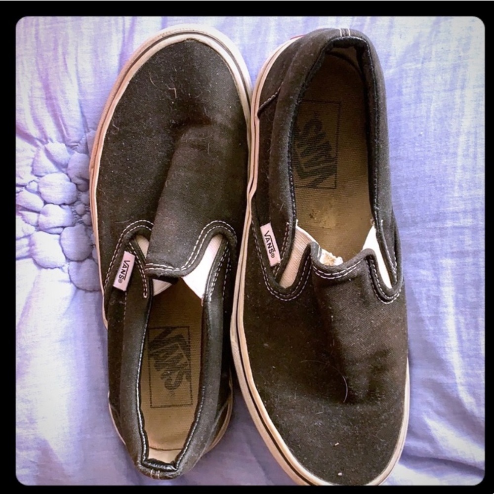 Black Vans slip ons